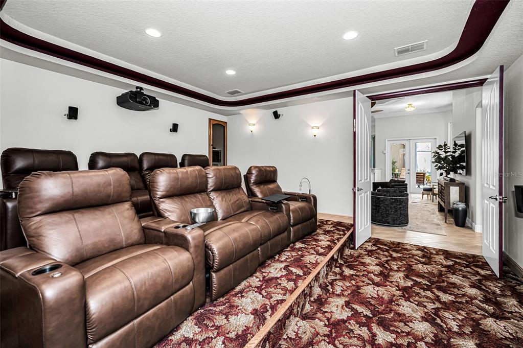 10709 Watula Court New Port Richey, FL 34655 - Photo 41 of 99 a media room with furniture and a rug