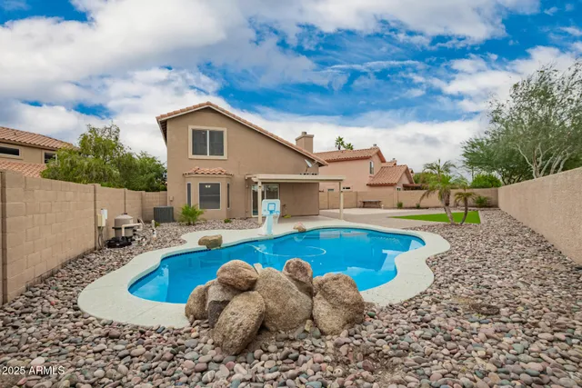 a front view of house with outdoor space