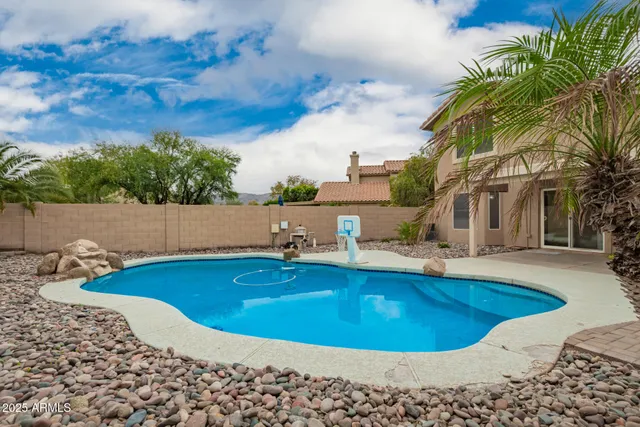 a view of swimming pool outdoor seating