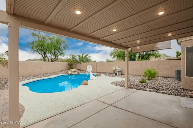 a white bath tub sitting in a backyard