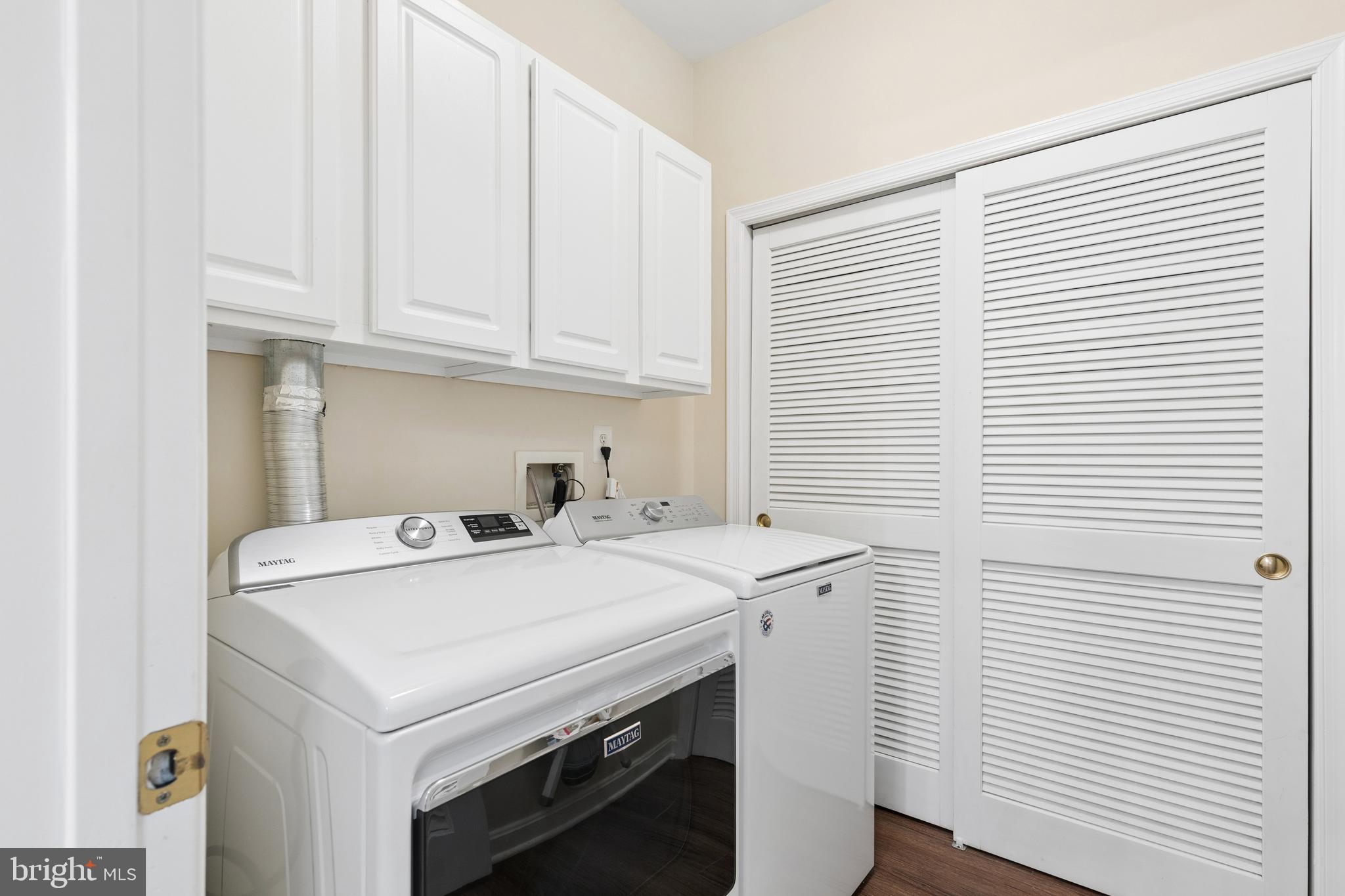 431 Hamlet Club Drive, Unit 102 Edgewater, MD 21037 - Photo 15 of 55 a utility room with dryer and washer