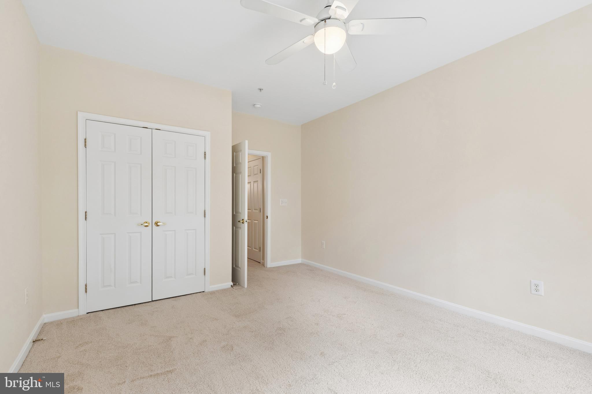 431 Hamlet Club Drive, Unit 102 Edgewater, MD 21037 - Photo 33 of 55 a view of an empty room
