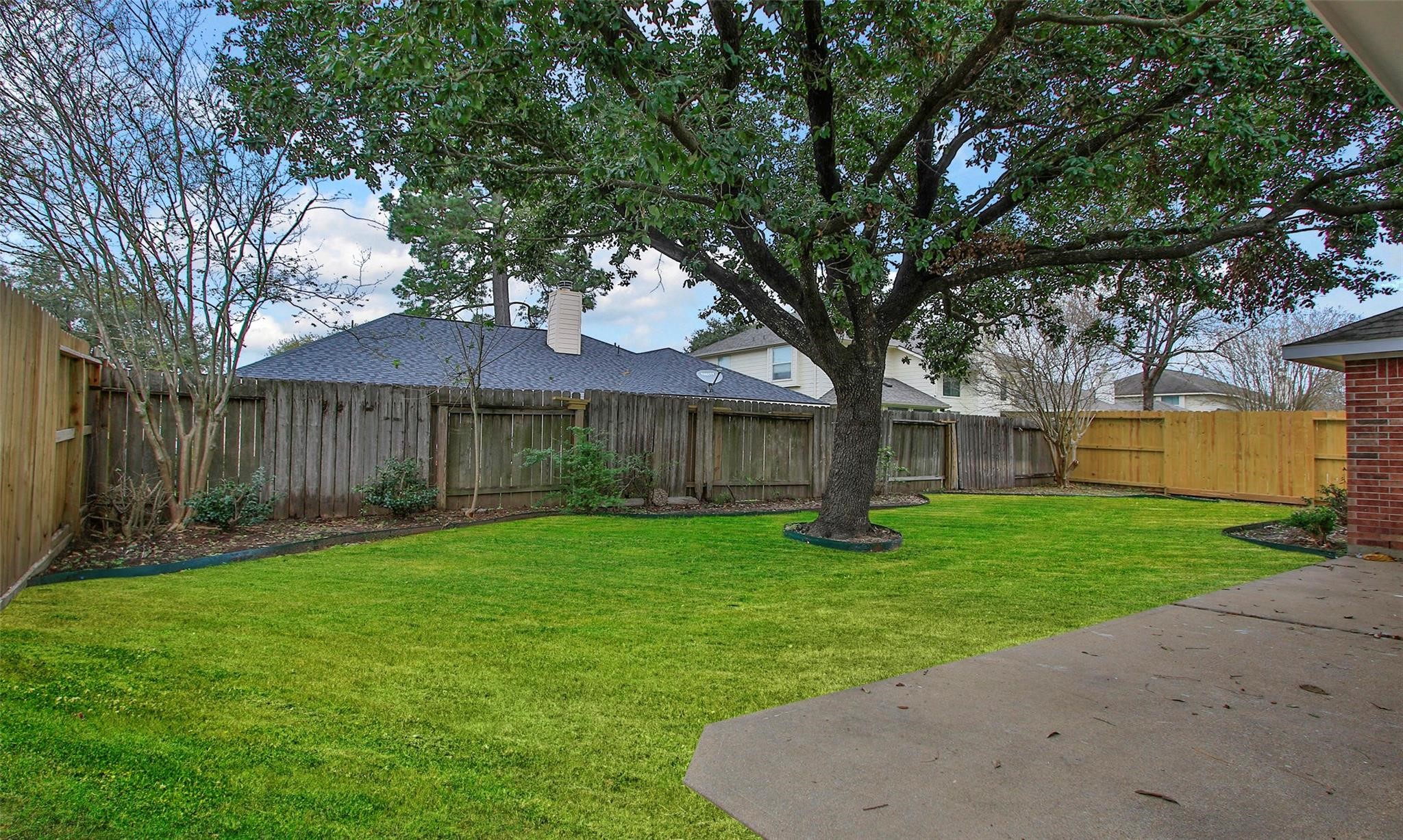 2414 Cres Hollow Court Spring, TX 77388 - Photo 34 of 37 a view of a house with a yard