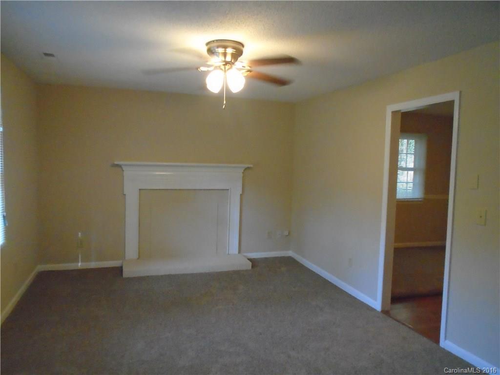 6011 Trotters Ridge Road Charlotte, NC 28227 - Photo 2 of 8 a view of empty room with a fan