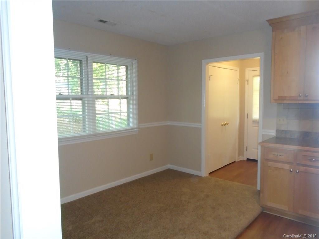 6011 Trotters Ridge Road Charlotte, NC 28227 - Photo 4 of 8 a view of an empty room with a window