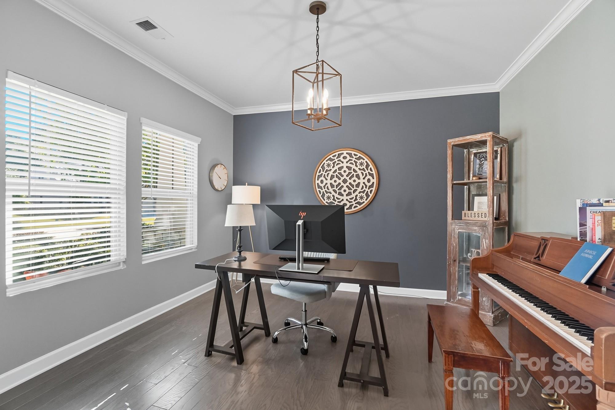 2048 Poplar Ridge Drive Monroe, NC 28110 - Photo 16 of 44 a workspace with furniture and a window