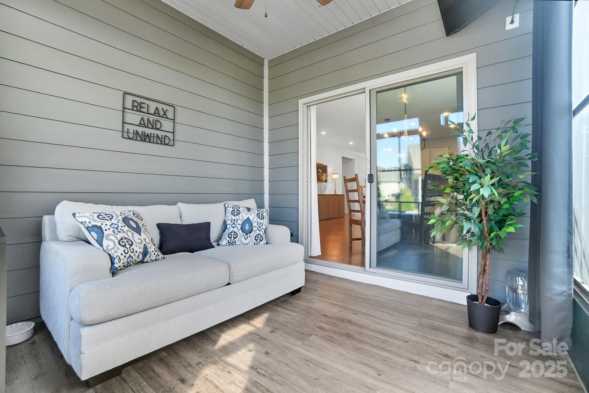 2048 Poplar Ridge Drive Monroe, NC 28110 - Photo 19 of 44 a living room with furniture and potted plants