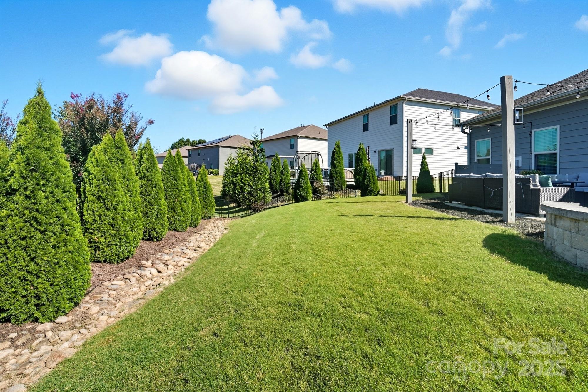 2048 Poplar Ridge Drive Monroe, NC 28110 - Photo 34 of 44 a front view of a house with a yard