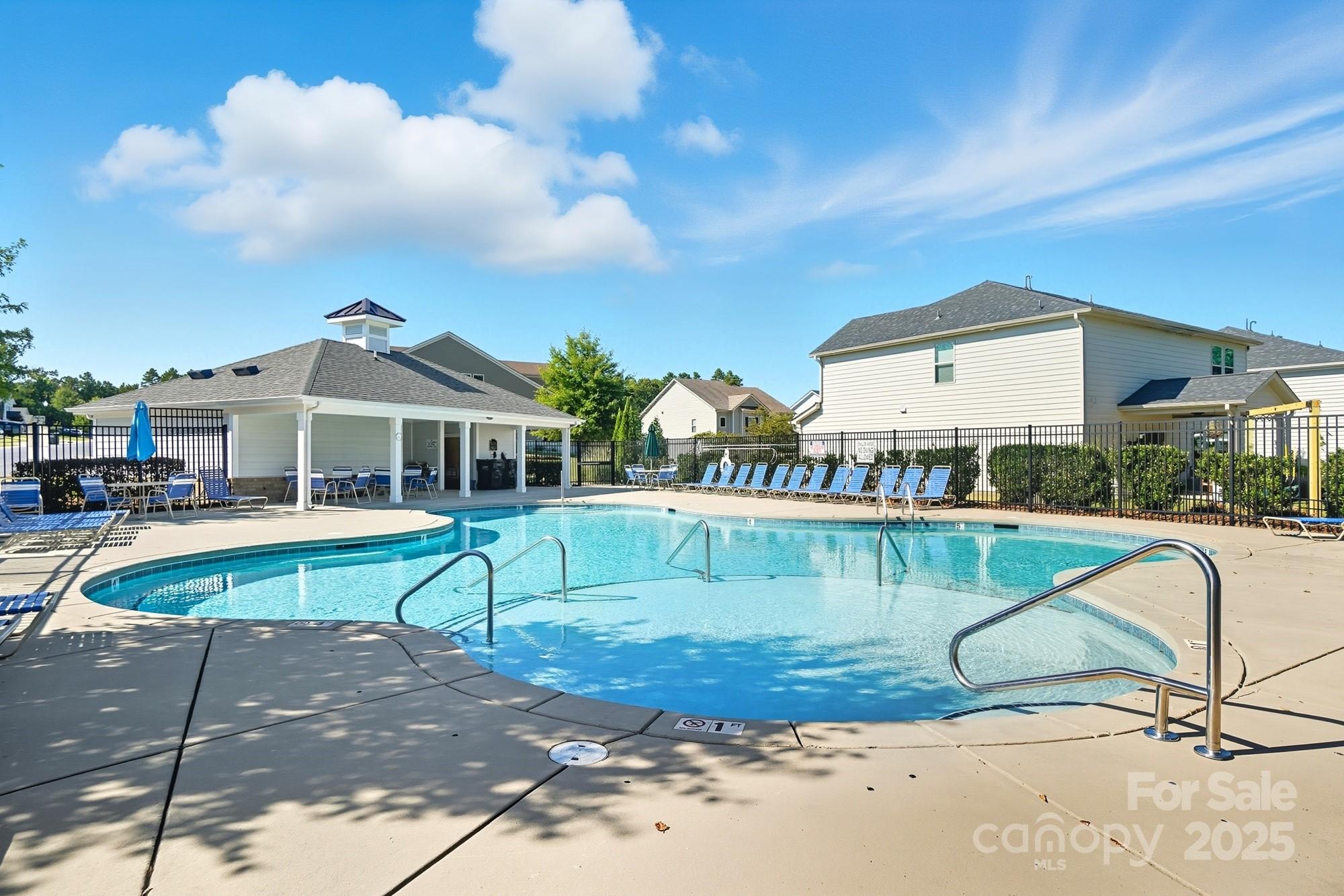 2048 Poplar Ridge Drive Monroe, NC 28110 - Photo 42 of 44 a view of a swimming pool with a patio