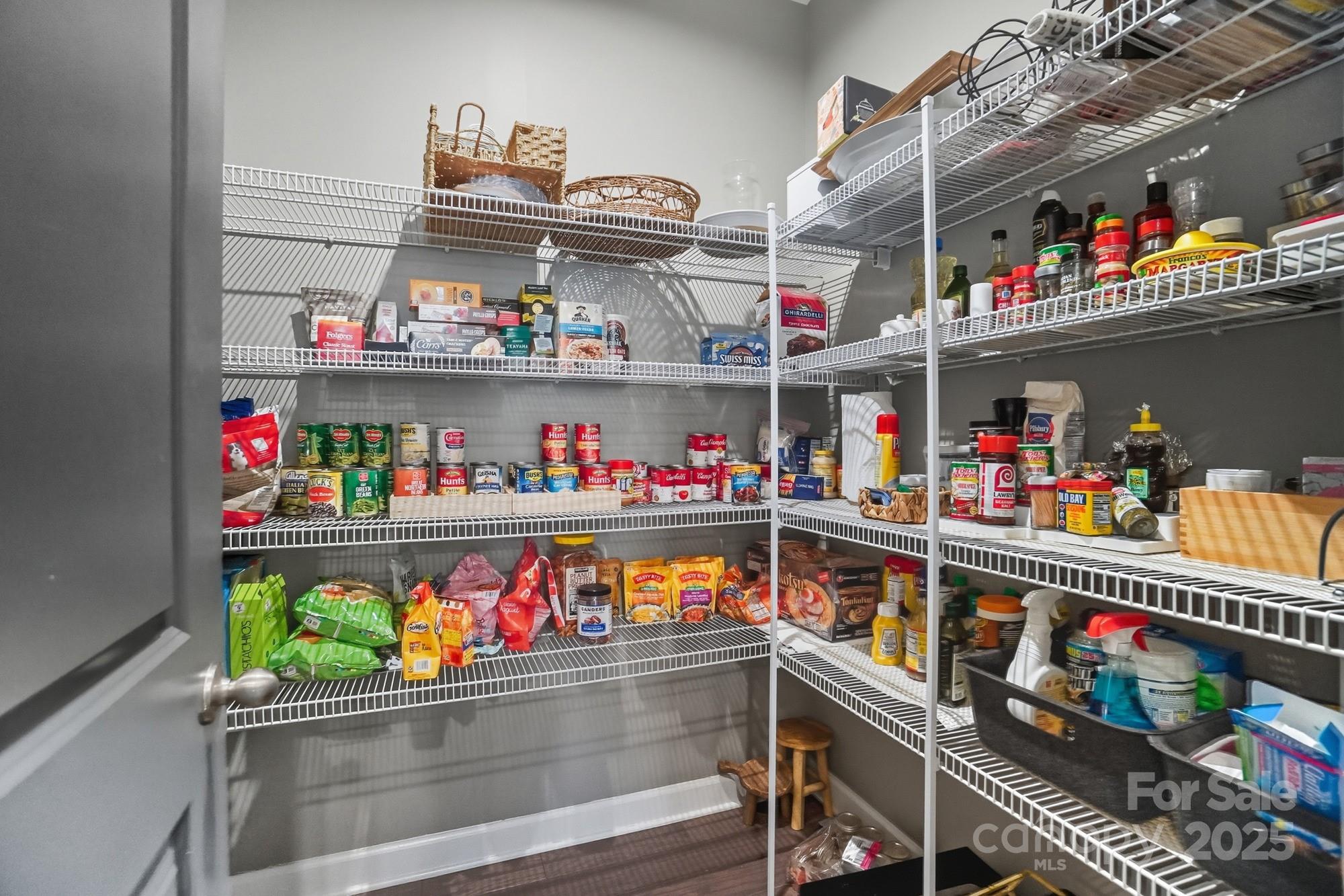 2048 Poplar Ridge Drive Monroe, NC 28110 - Photo 10 of 44 a store room with lots of different kinds of food