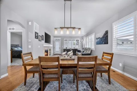 a view of a dining room with furniture