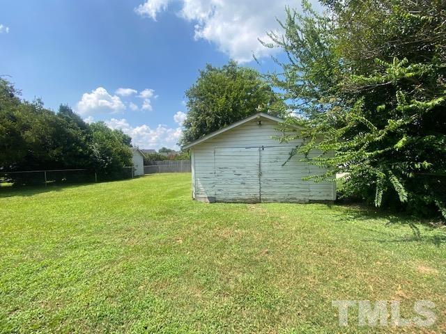 200 South 11th Street Erwin, NC 28339 - Photo 15 of 20 a backyard of a house with lots of green space