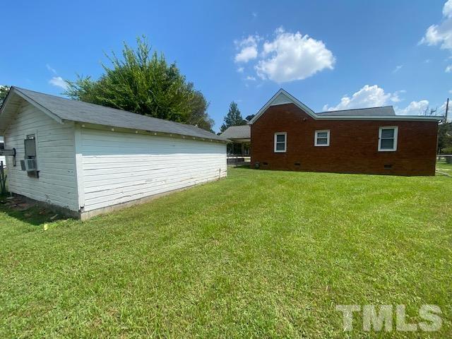 200 South 11th Street Erwin, NC 28339 - Photo 17 of 20 a house view with a garden space