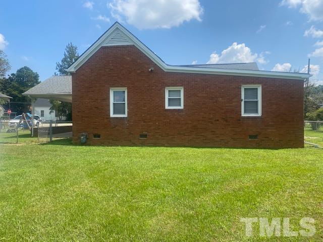 200 South 11th Street Erwin, NC 28339 - Photo 18 of 20 a view of house with backyard