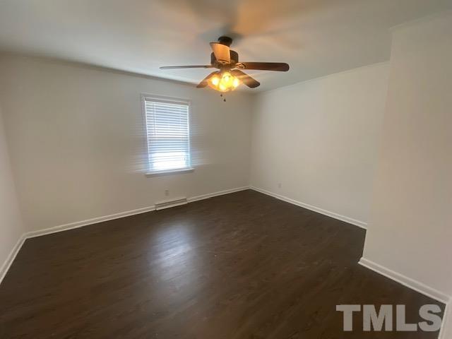 200 South 11th Street Erwin, NC 28339 - Photo 9 of 20 a view of wooden floor in a room