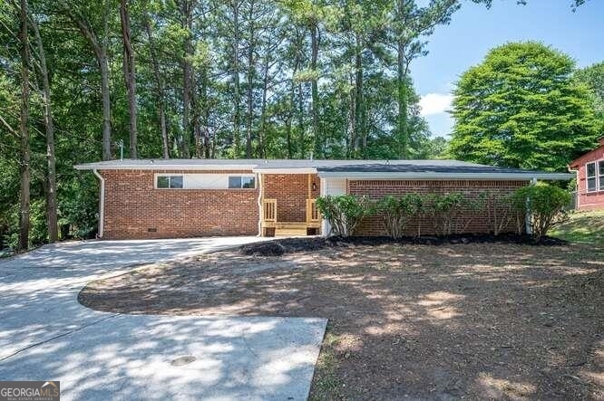 6419 Maddox Road Morrow, GA 30260 - Photo 1 of 1 a view of a outdoor space with garage