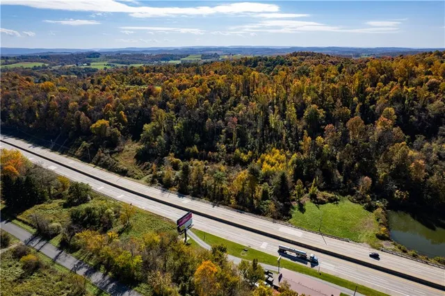 a view of swimming pool from a balcony