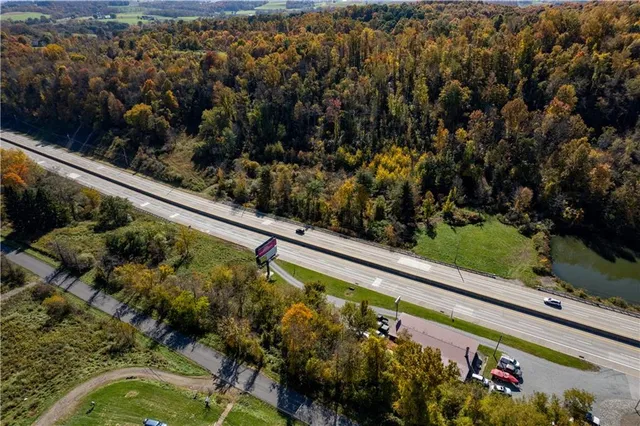 a view of a yard with an outdoor seating