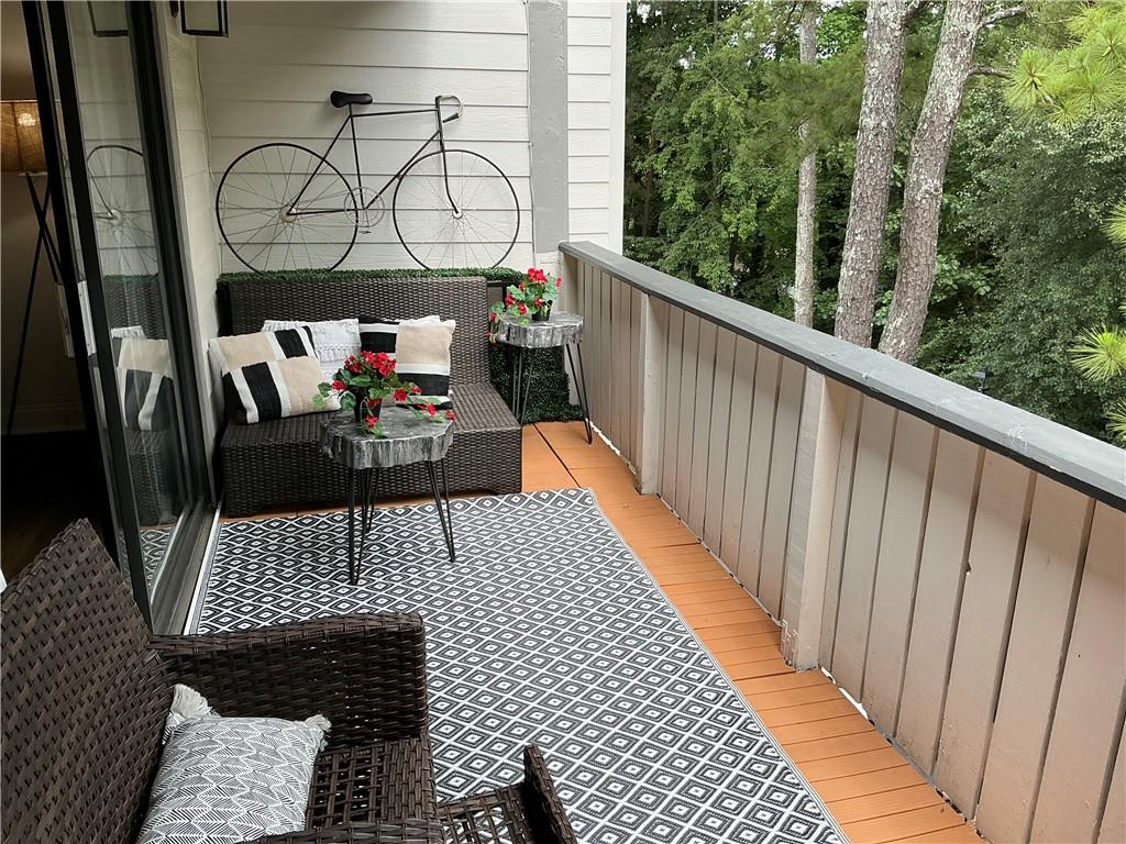 3823 Paces Ferry West Atlanta, GA 30339 - Photo 9 of 33 a view of balcony with wooden floor