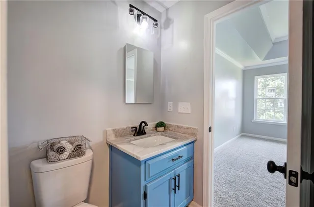 a bathroom with a sink and a toilet