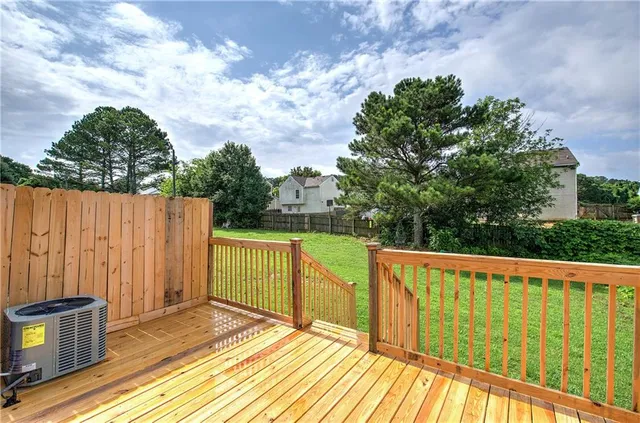a backyard of a house with lots of green space
