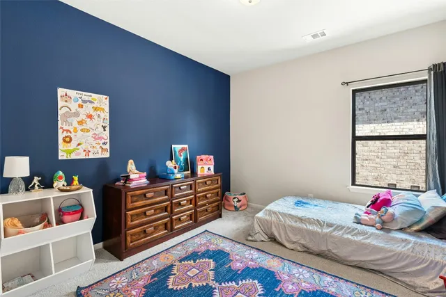 a bathroom with a sink vanity and a mirror