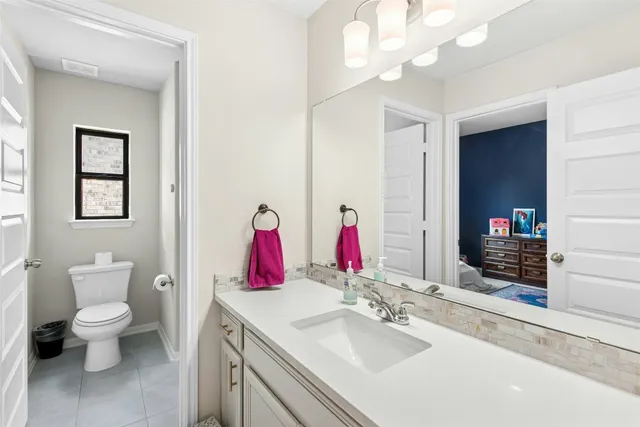 a bedroom with bed and a window