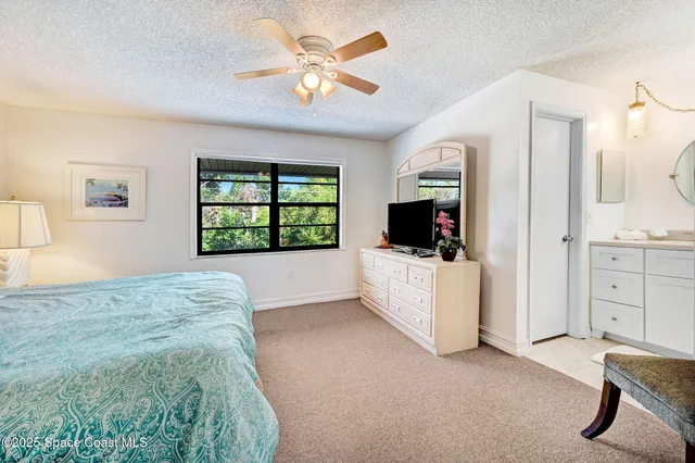a bathroom with a toilet and a bathtub