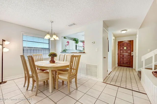 a bathroom with a toilet a sink and a mirror