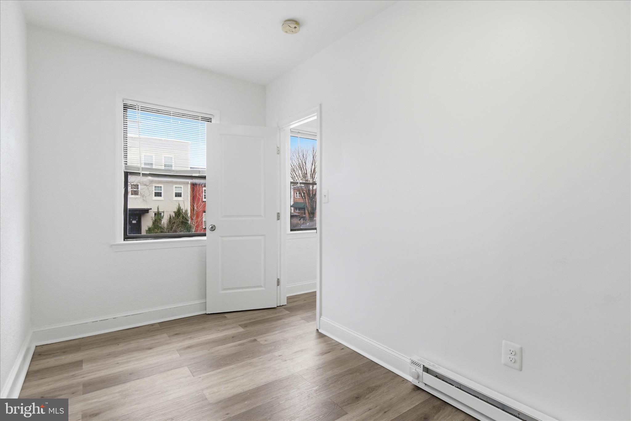 221 20th Street Northeast, Unit 4 Washington, DC 20002 - Photo 22 of 30 a view of a hallway with wooden floor