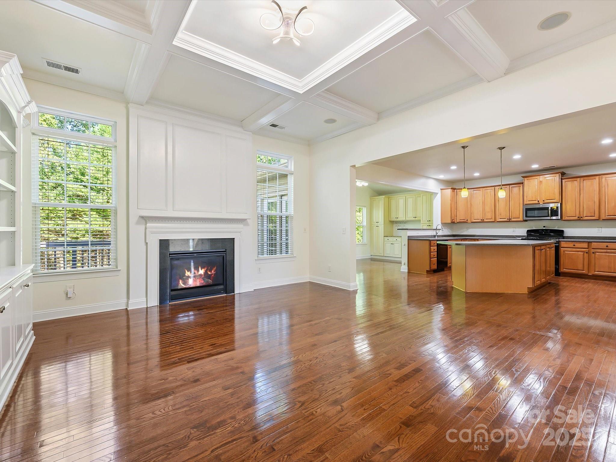 524 Becker Avenue Fort Mill, SC 29715 - Photo 15 of 39 a view of kitchen with furniture and wooden floor