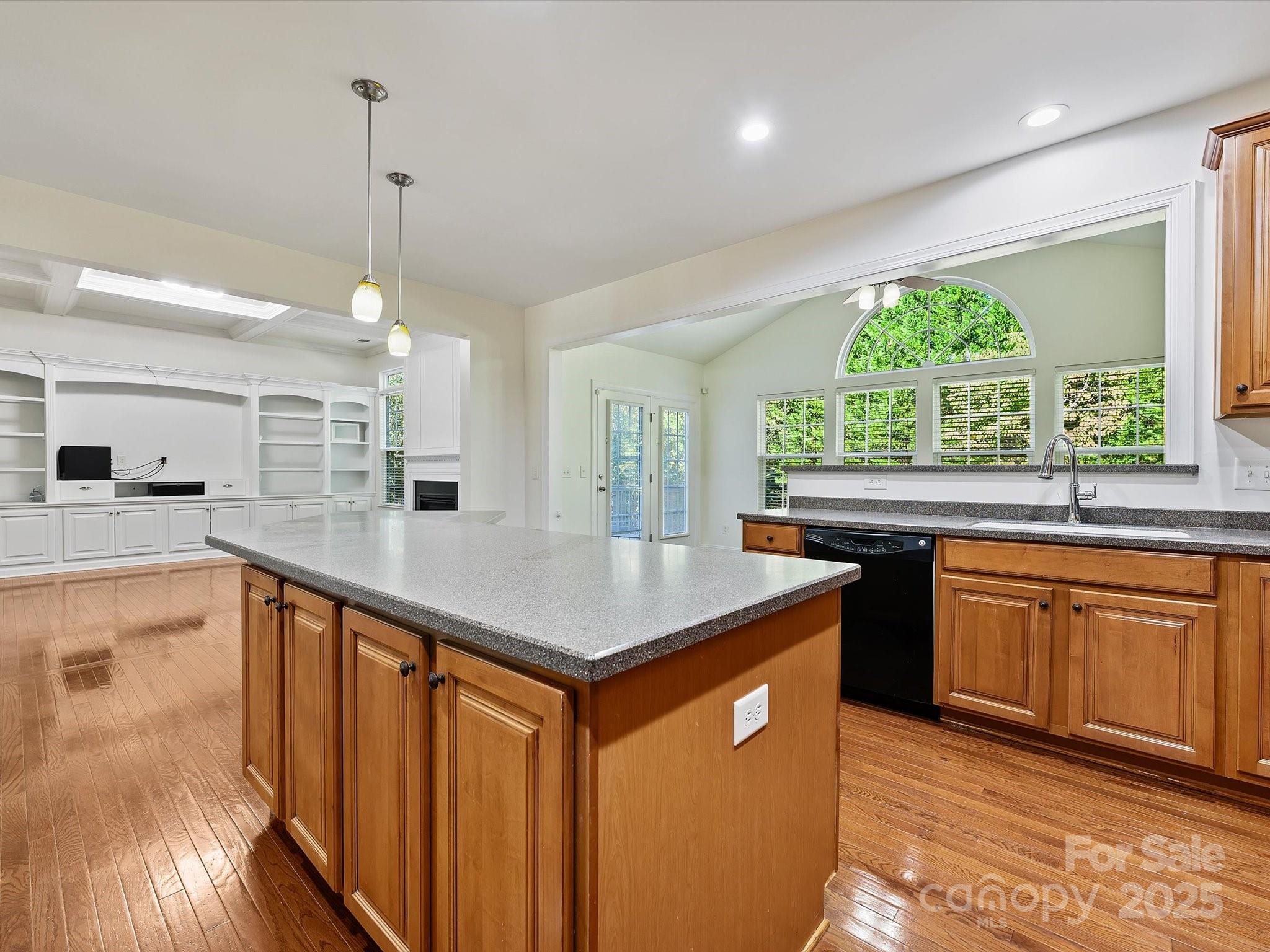 524 Becker Avenue Fort Mill, SC 29715 - Photo 21 of 39 a kitchen with stainless steel appliances granite countertop a sink a stove and a wooden floors