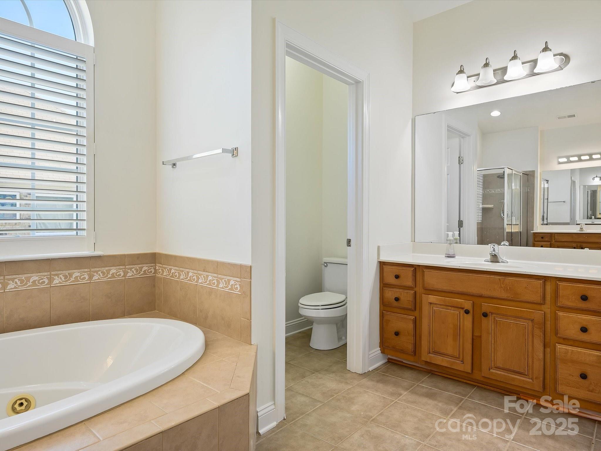 524 Becker Avenue Fort Mill, SC 29715 - Photo 36 of 39 a bathroom with a sink and a bathtub