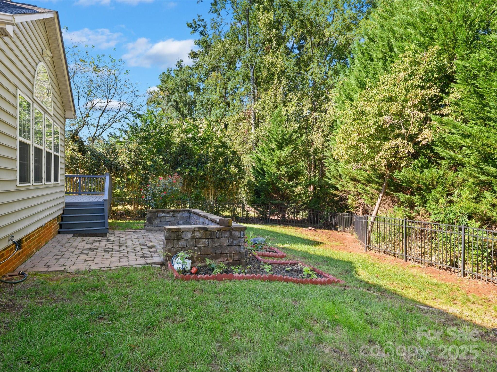524 Becker Avenue Fort Mill, SC 29715 - Photo 38 of 39 a view of backyard with slide and trees