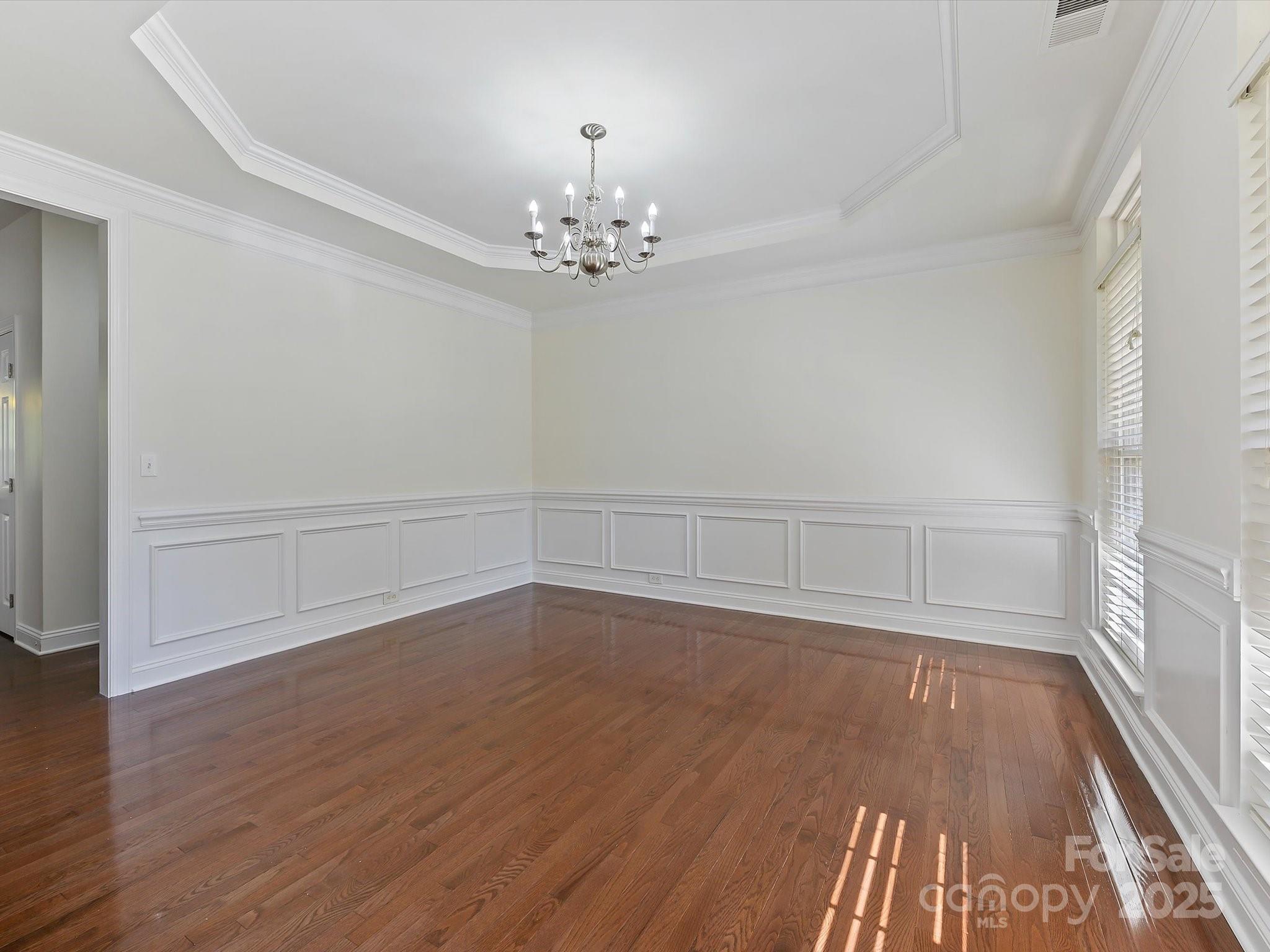 524 Becker Avenue Fort Mill, SC 29715 - Photo 8 of 39 wooden floor in an empty room with a window
