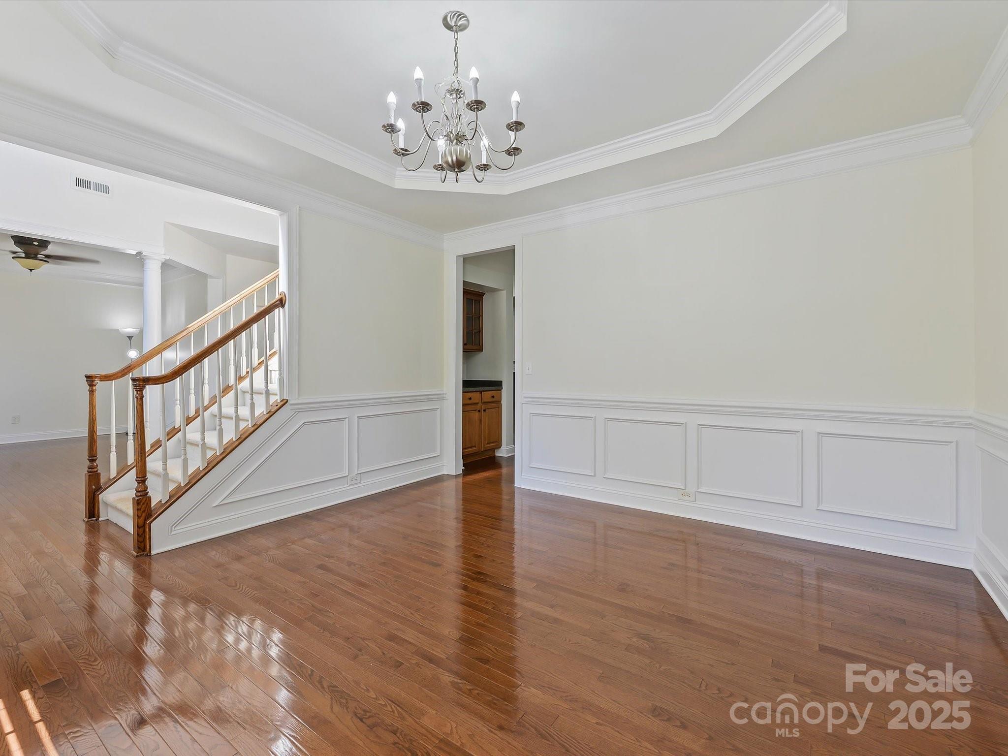524 Becker Avenue Fort Mill, SC 29715 - Photo 9 of 39 a view of an empty room with wooden floor