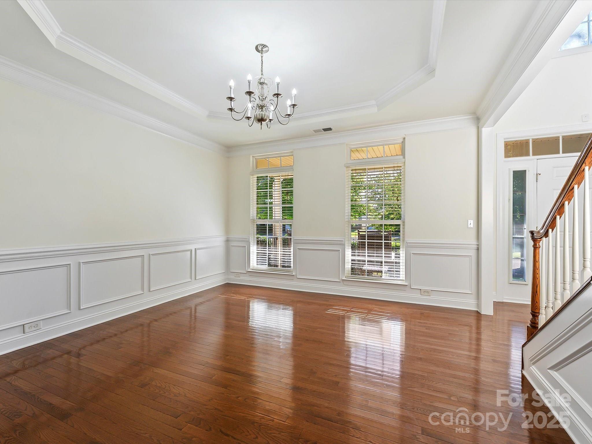 524 Becker Avenue Fort Mill, SC 29715 - Photo 10 of 39 a view of an empty room with wooden floor and a window