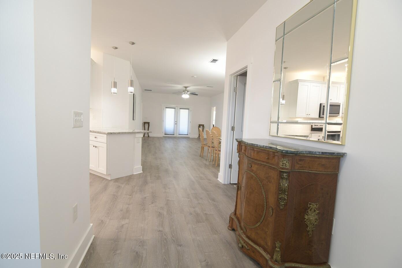 961 Calypso Way, Unit LOT 20 Jacksonville, FL 32233 - Photo 10 of 35 a view of a kitchen cabinets and wooden floor