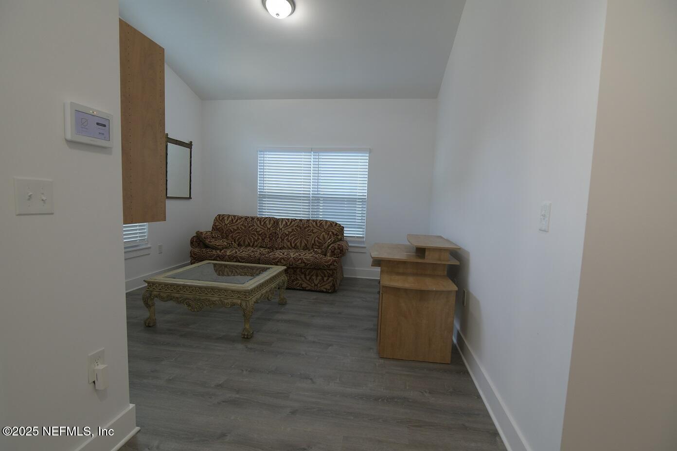 961 Calypso Way, Unit LOT 20 Jacksonville, FL 32233 - Photo 11 of 35 a living room with furniture and a air conditioner vent