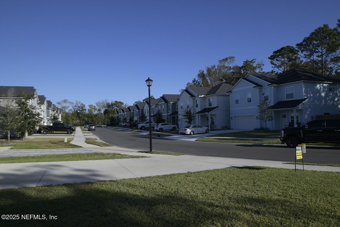 961 Calypso Way, Unit LOT 20 Jacksonville, FL 32233 - Photo 7 of 35 a childrens park with lots of swings and slides