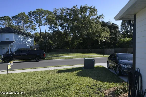 a view of a yard with a sitting area