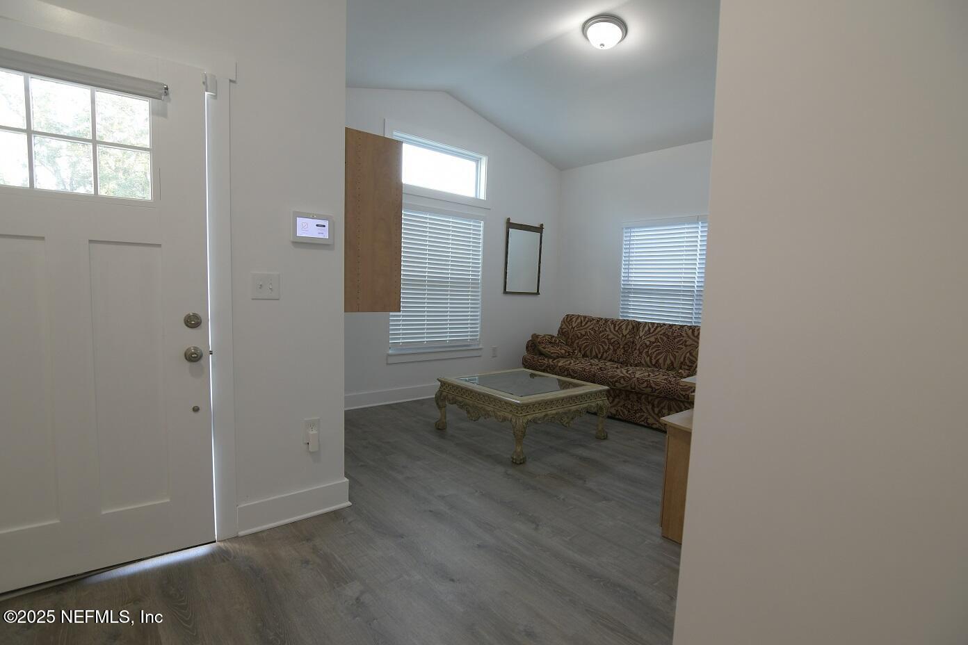 961 Calypso Way, Unit LOT 20 Jacksonville, FL 32233 - Photo 9 of 35 a living room with furniture and a window