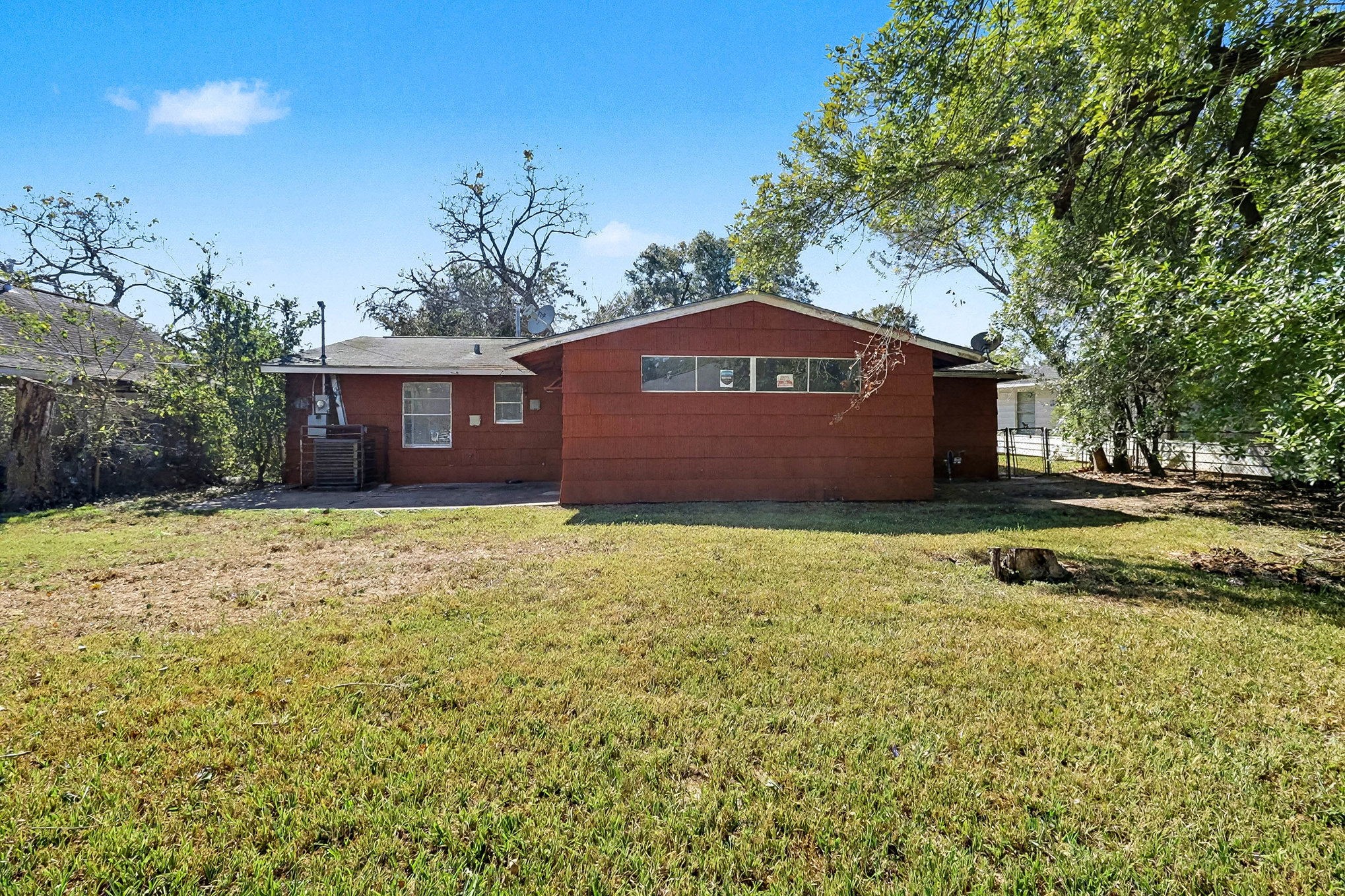 5711 Ridgeway Drive Houston, TX 77033 - Photo 27 of 29 a front view of a house with a yard