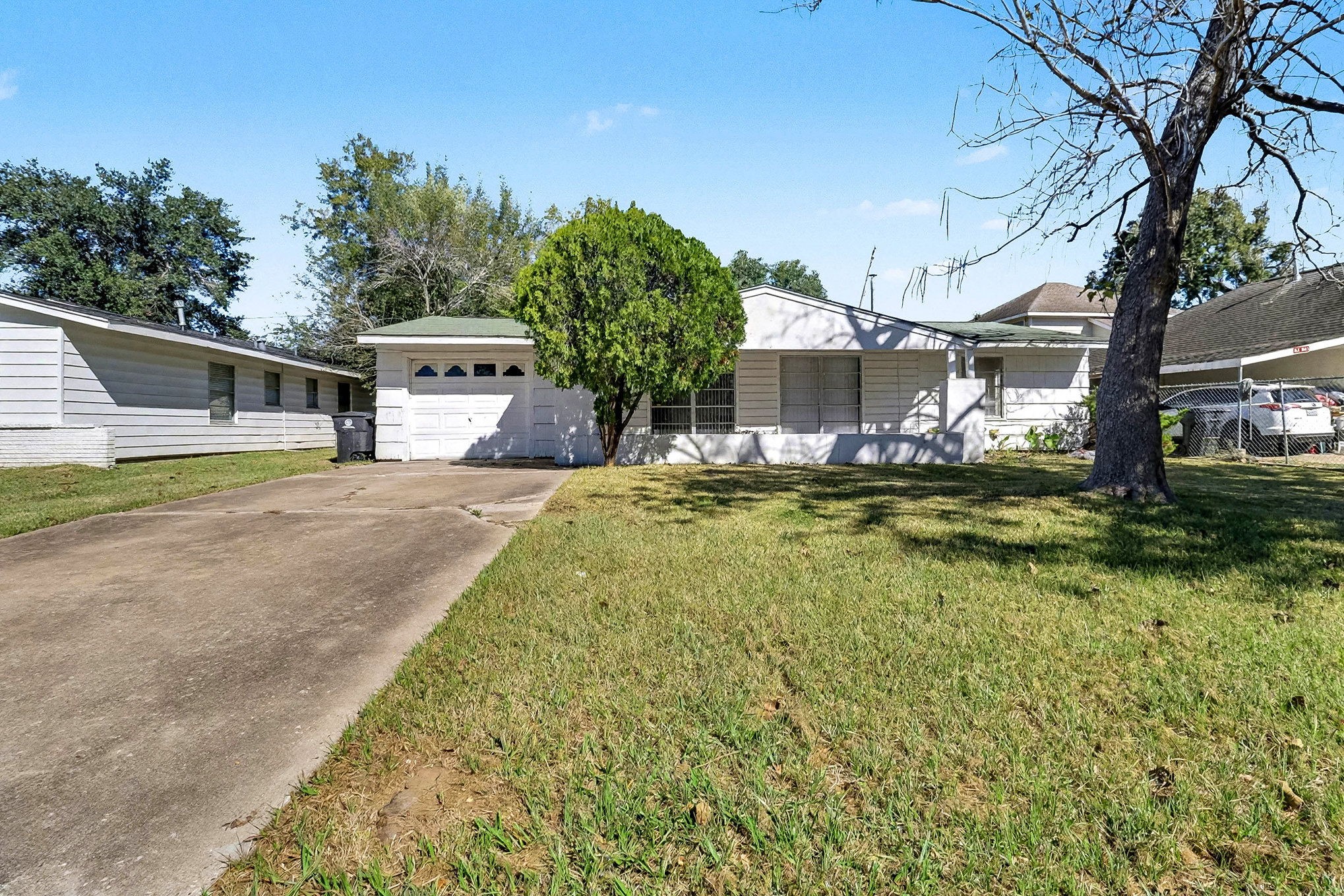 5711 Ridgeway Drive Houston, TX 77033 - Photo 4 of 29 a house with swimming pool in front of it