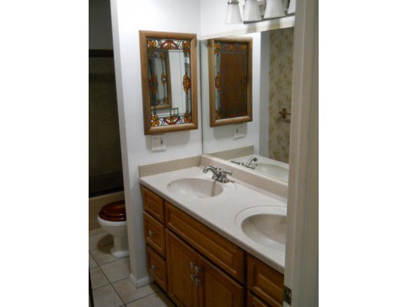 4350 East Beaver Vista Road Rimrock, AZ 86335 - Photo 7 of 8 a bathroom with a sink and a mirror