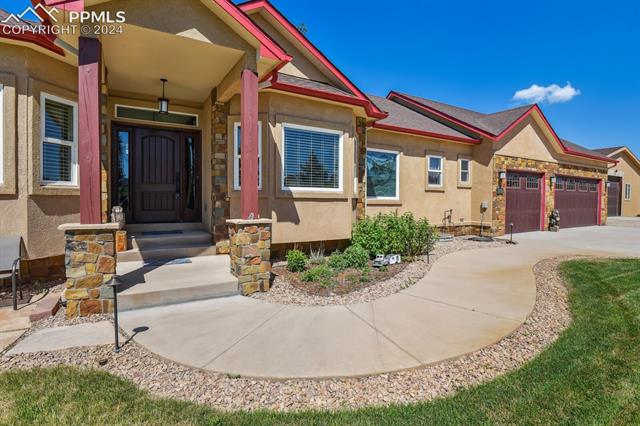 12810 Holmes Road Colorado Springs, CO 80908 - Photo 1 of 45 View of property entrance