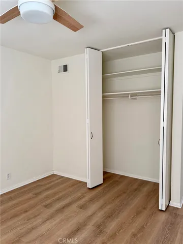 a view of room with hardwood floor