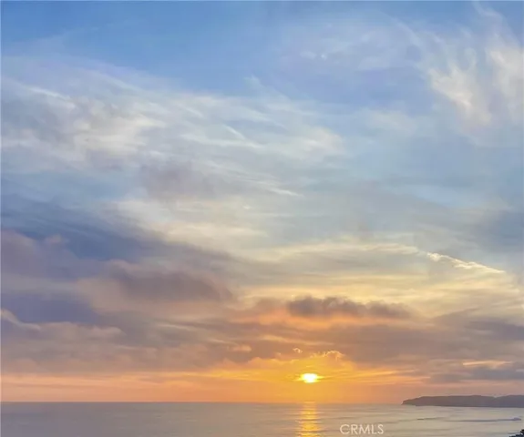 a kitchen with stainless steel appliances granite countertop a stove a sink dishwasher and a refrigerator