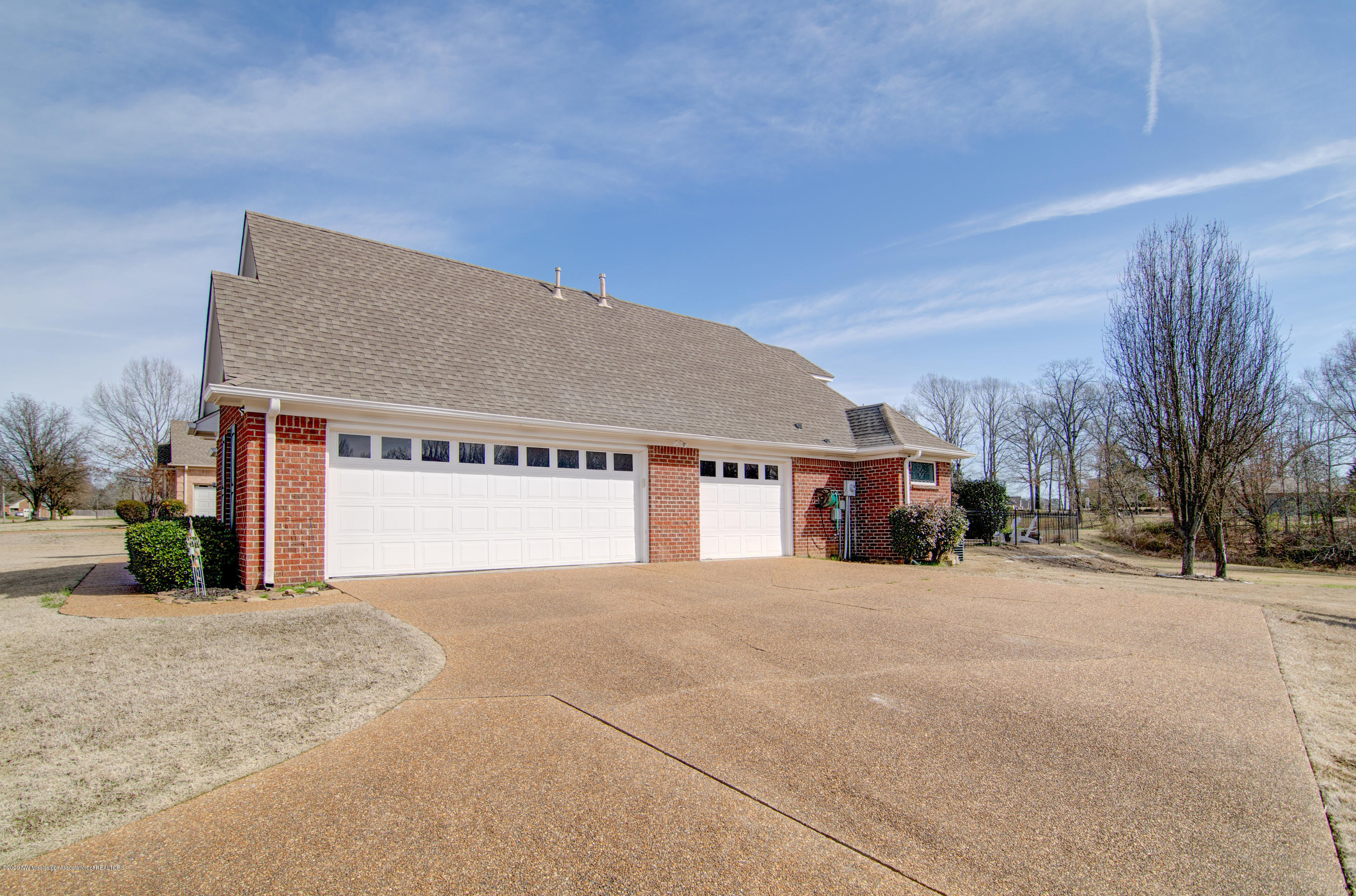 3426 Rhett Butler Drive Hernando, MS 38632 - Photo 3 of 30 3 CAR GARAGE!!