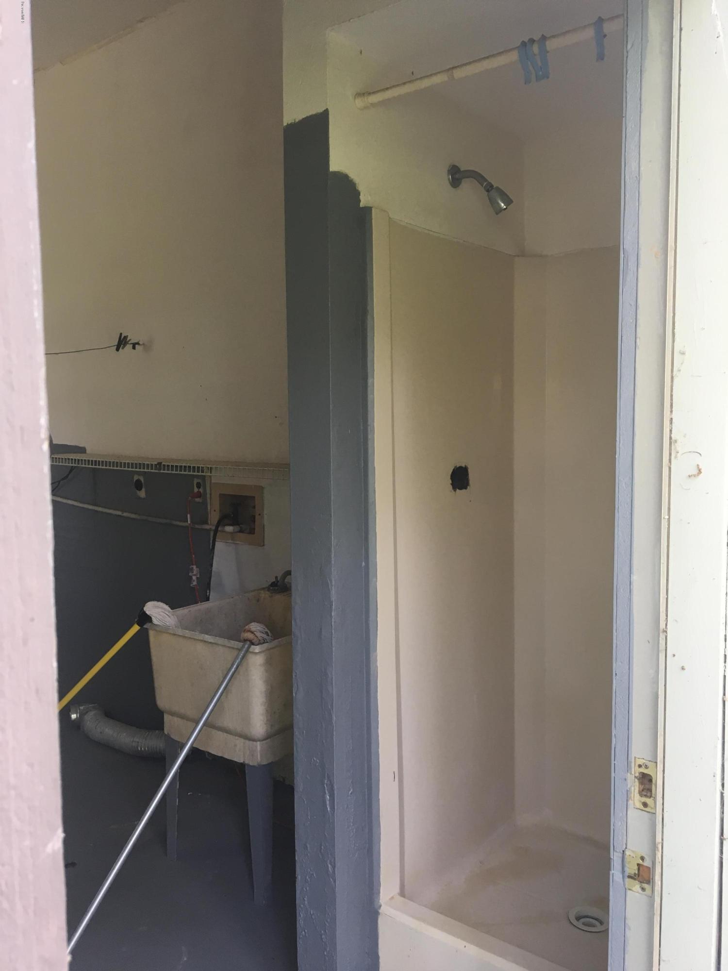 3485 Turtle Mound Road Melbourne, FL 32934 - Photo 27 of 30 Shower in Garage